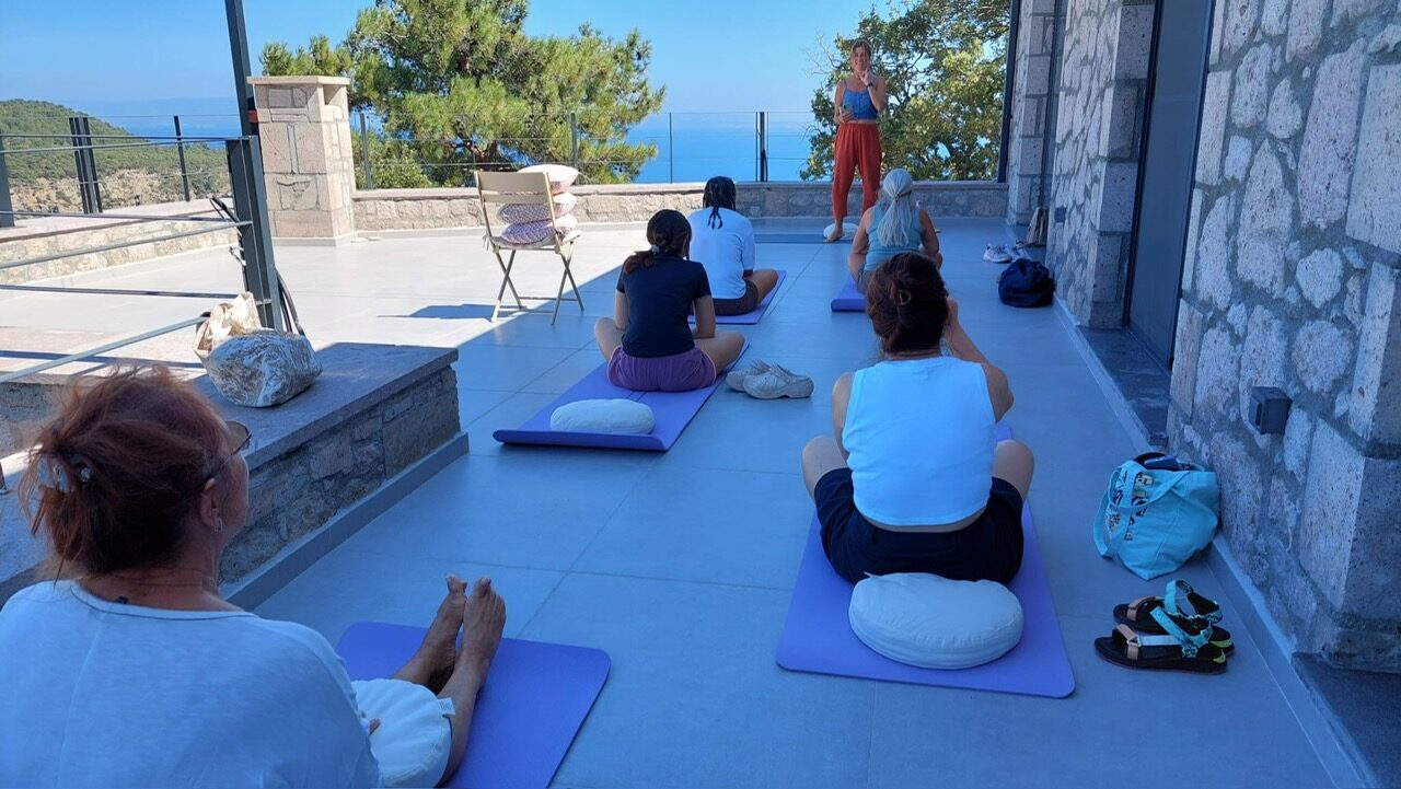 Seated practice facing the teacher